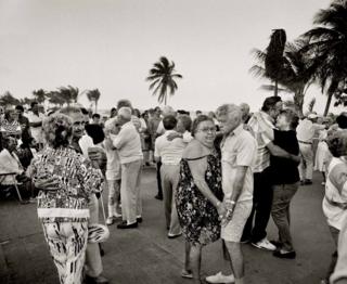 Elderly couples dance together on Miami Beach