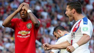 Marcus Rashford ati Joel Ward