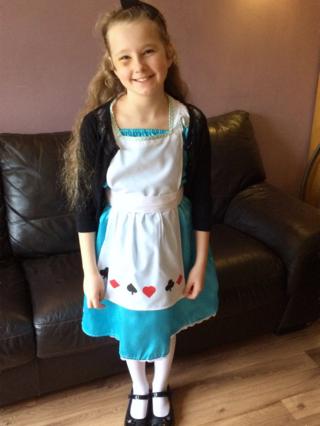 This is Charlie from Bolton and here she is as Alice in Wonderland, her favourite book ever.