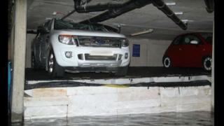 Car crushed by wet insulation