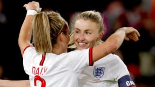 Leah Williamson hugs Rachel Daly