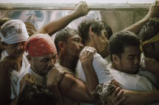 Men in a religious procession