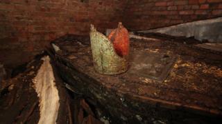 An archbishop's mitre was found resting on top of the coffins