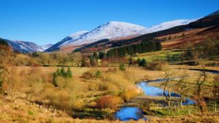 A snowcapped Bodesbeck Law in Moffat Water Valley