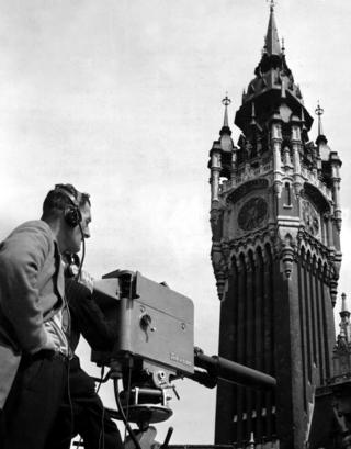 Television Camera facing the Clock Tower of the Hotel de Ville, Calais. Richard Dimbleby and Alan Adair gave commentaries on the festivities and interviewed local personalities in the front of the cameras, August 1950.