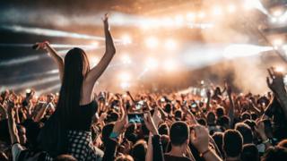 A crowd at a music concert