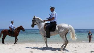 Police patrolling beach near scene of 26 June attack