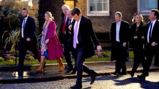 Conservative MPs arrive in Downing Street, London, for a breakfast meeting with Prime Minister Rishi Sunak, on 12 December 2023
