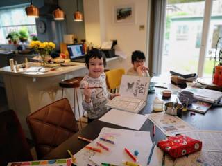 Two boys working at home