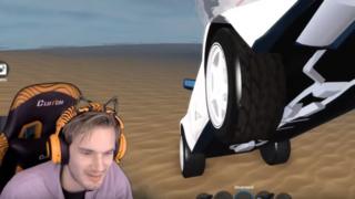 PewDiePie playing Roblox. He is in his gaming chair, wearing matching headphones, with the game playing in the background.