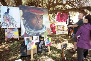 An artwork on display during the Harare International Festival of the Arts (HIFA) in Zimbabwe, shown on 2 June. HIFA is a 6-day annual festival of theatre, dance, music, circus, street performance, fashion and visual arts.