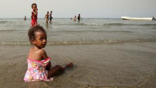 A girl plays at the beach in the port city of Massawa, Eritrea July 22, 2018.