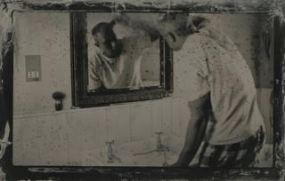 Man looking in mirror