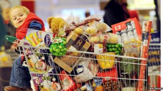 Child in shopping trolley