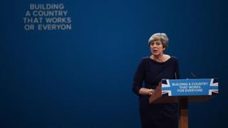 Theresa May giving speech at Conservative conference
