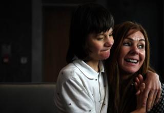 Billy Caldwell and his mother Charlotte arrive to give a news conference in Belfast, Northern Ireland, July 5, 2018
