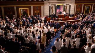 Democratic members celebrate in the House Chamber, as President Donald Trump recognizes their achievement of electing a record number of women to Congress