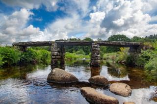 A bridge reflected in water