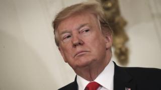 U.S. President Donald Trump looks on during an event recognizing the Wounded Warrior Project Soldier Ride in the East Room of the White House, April 18, 2019 in Washington, DC.