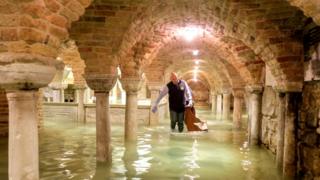 The flooded crypt of St Mark's Basilica is pictured during exceptionally high water levels in Venice, Italy, 13 November 2019