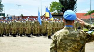 Миротворці