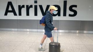 A passenger arrives at Heathrow on Sunday