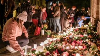 Mourners law flowers after the attack in Halle, October 2019