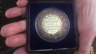 The medal given to Olive Harrisson