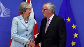 Theresa May and Jean-Claude Junker