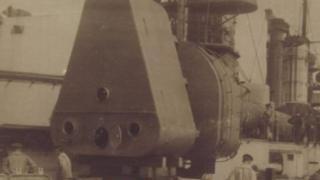 Historic image of a warship's spotting top