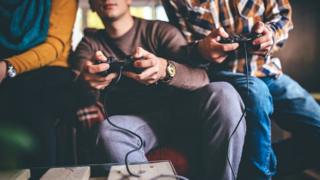 People playing computer games
