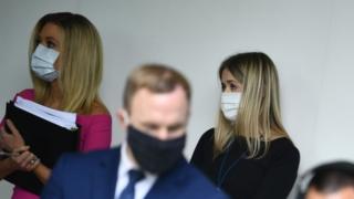 White House staff members wearing masks, May 11, 2020