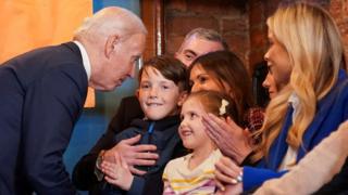Joe Biden speaks to a young, distant relative in a pub in County Louth