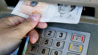 Person using cash machine