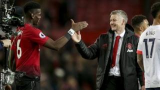 Ole Gunnar Solskjaer (left) and Paul Pogba