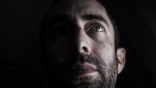 صورة تعبيرية: شاب يتأمل