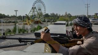 Afghan security personnel fighting against the Taliban in Herat