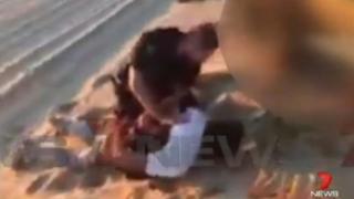 An Australian man, 59, is arrested on a remote beach south of Adelaide over the attempted murder and kidnapping of two backpackers