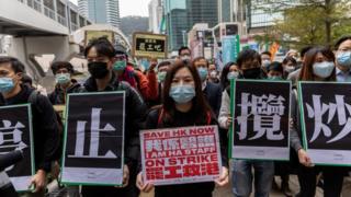 Medical staff strike demanding a full closure of the border with the mainland