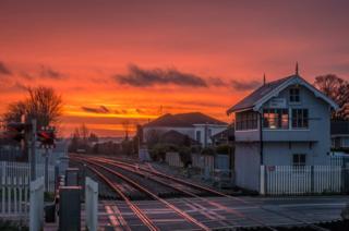 Sunrise at a train station