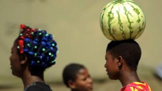 Water melon for head of young girl