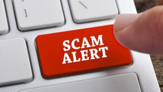 Scam alert button