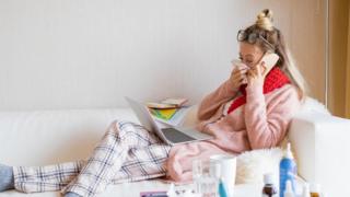 Generic picture of woman at home sick