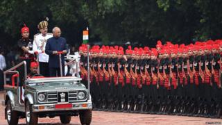 Incoming Indian president Ram Nath Kovind inspects a guard of honour during a ceremony at the Presidential Palace in New Delhi on July 25, 2017.