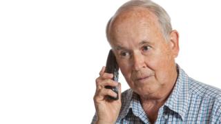 older man on phone