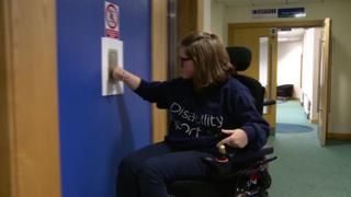 Claire Taggart using a lift