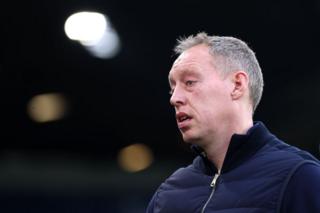 Steve Copper looks on