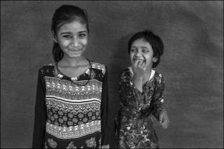 Nisha (left) and a friend at the Chingari Trust physical therapy clinic in Bhopal