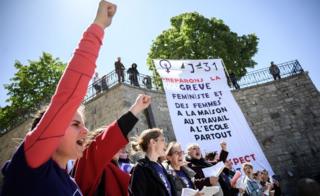 Women demonstrate in Lausanne ahead of a nationwide women's strike in Switzerland on 14 June 2019
