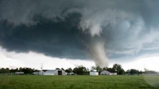 Romania tornado overturns bus and leaves 12 hurt - BBC News